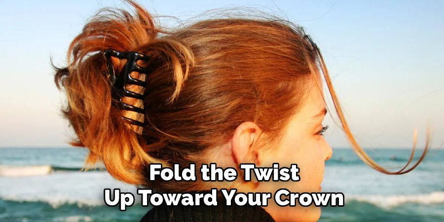 Fold the Twist Up Toward Your Crown